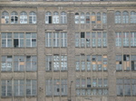 25008 Writing on windows of abandoned building.jpg